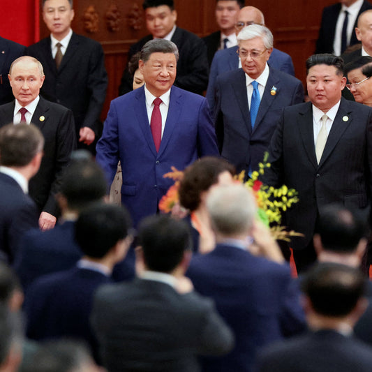 Xi Parades Military Strength as Trump Accuses Him of Conspiring With Putin and Kim