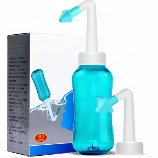 Blue nasal irrigation device with packaging on a white background
