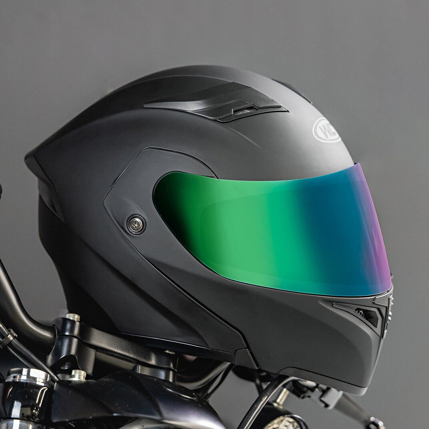 Full face dual visor flip modular motorcycle helmet with color lens, DOT approved, matte black design.