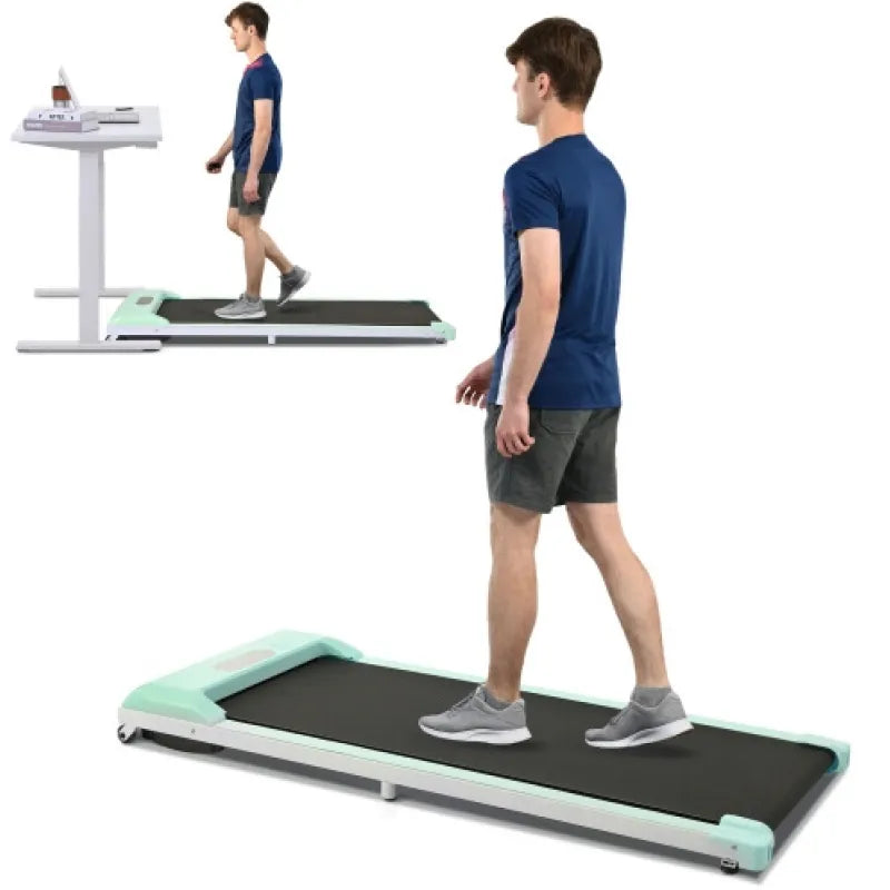 Under desk electric treadmill used for walking and working, with a man demonstrating its compact design.