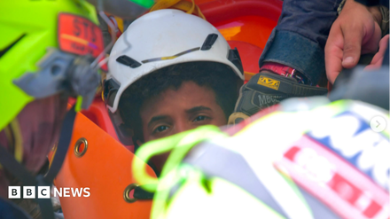 Rescuers digging through rubble in Venezuela