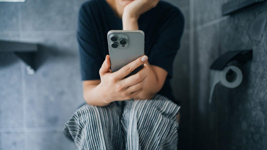 Checking Your Phone in the Bathroom Might Be Doing More Harm Than You Think