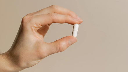 A person taking a pill