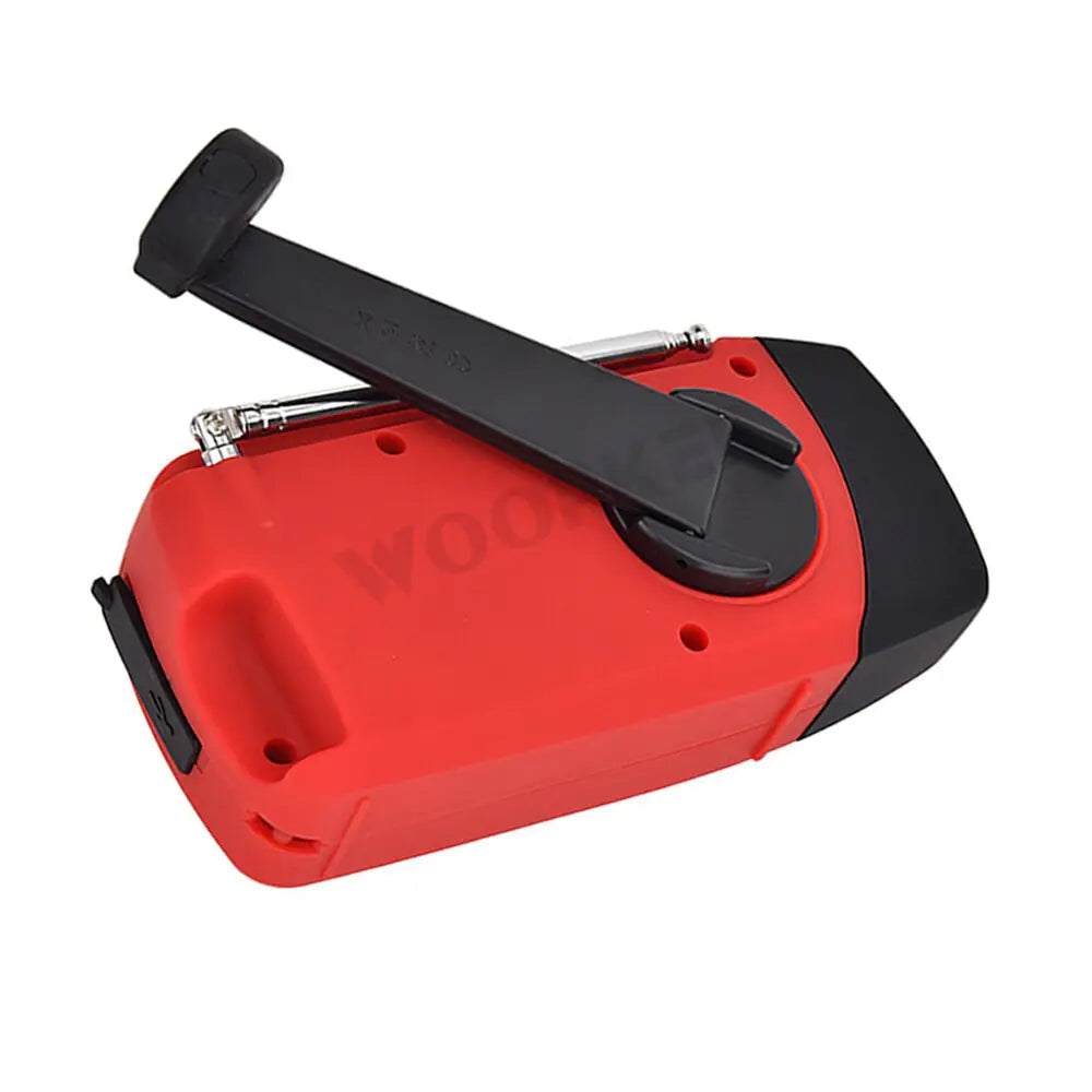 Versatile emergency radio with flashlight in red, featuring compact design and multifunctionality for outdoor and emergency use.